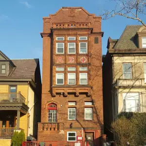 The Alpha Tau chapter house at dusk